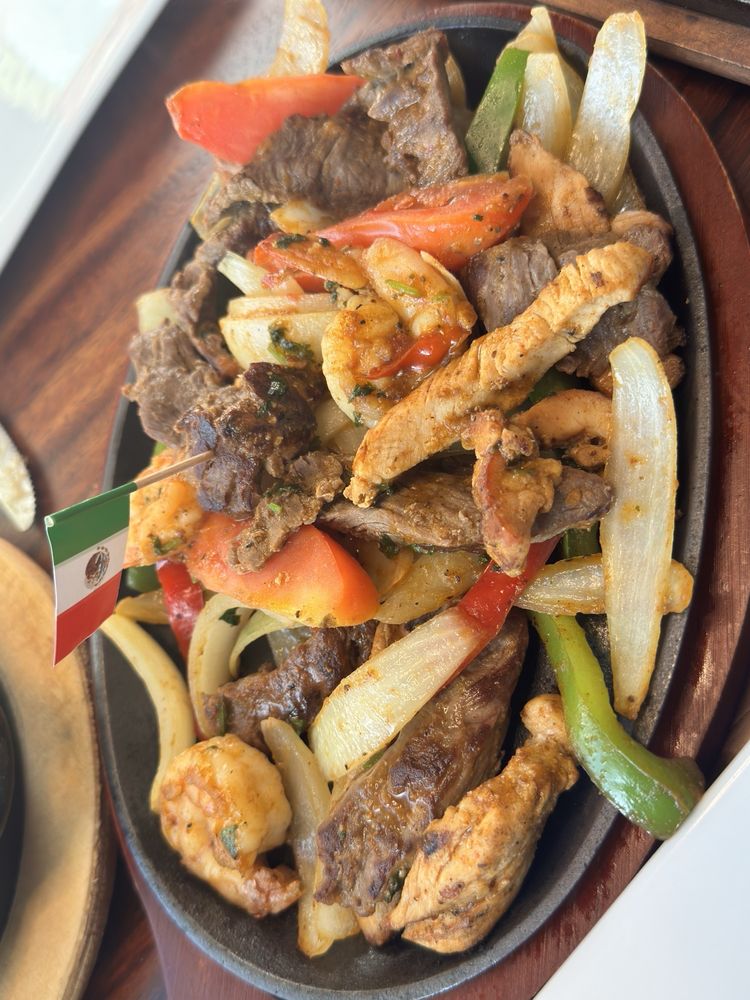 Beef, chicken, and shrimp fajitas at Viva Mexico